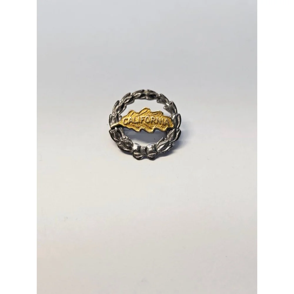 Vintage sterling and 10k mini brooch